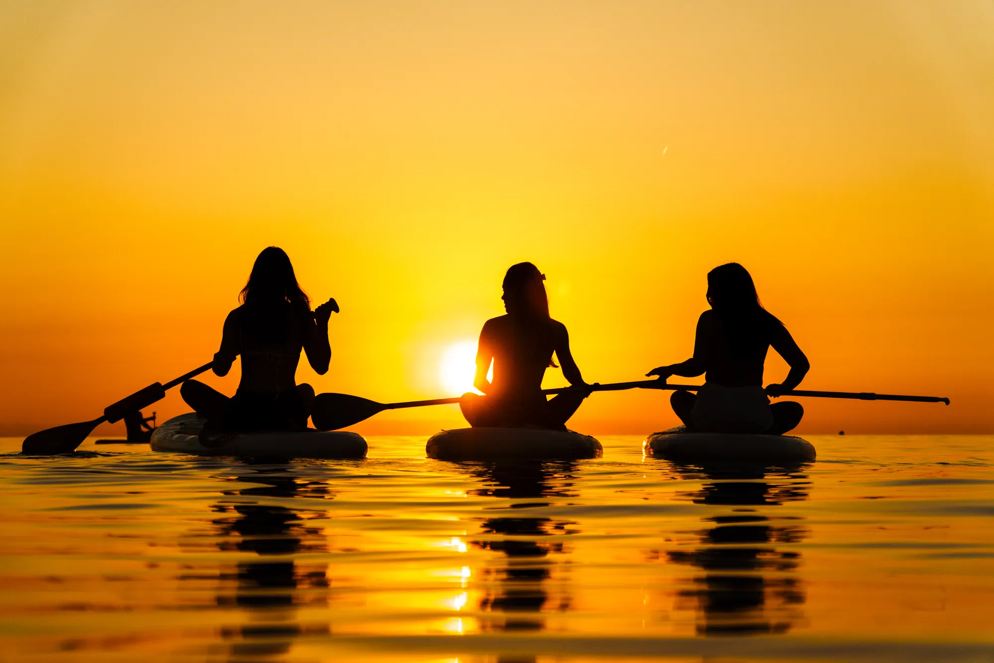Group paddle board tour at sunrise at Platja de la Riera Xica, Sitges